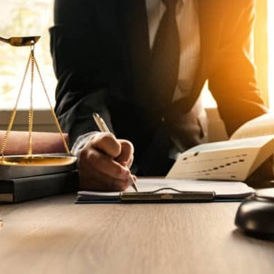 Close-up of lawyer working on paperwork